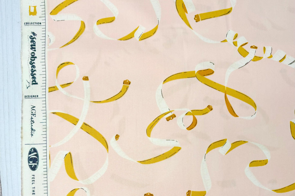 Pink cotton with measuring tapes. Art Gallery Fabrics, Measure Twice Woven fabric, quilt fabric, Sold by Half Yard